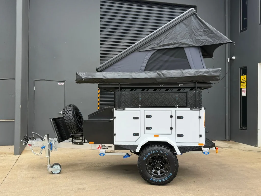 camper trailer with hard shell rooftop tent