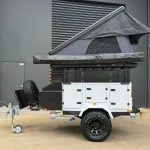 camper trailer with hard shell rooftop tent