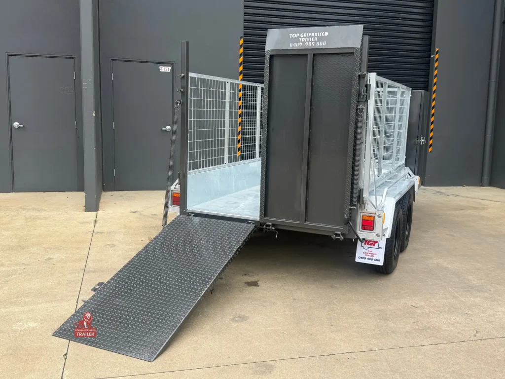 lawn mowing trailer with barn door ramps